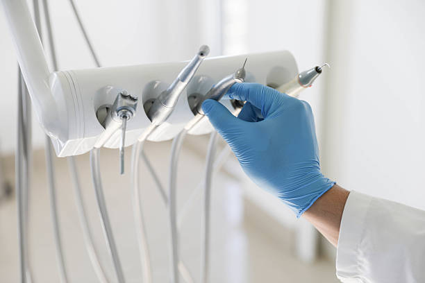 Professional Tooth Extraction technician working in Newington, VA